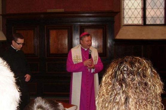  Grafika #1: Spotkanie opłatkowe z byłymi więźniami obozu Stutthof w Gańsku Oliwie