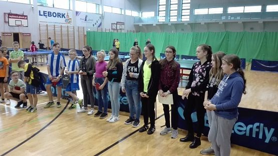  Grafika #8: Powiatowe zawody w tenisie stołowym dziewcząt i chłopców w ramach Igrzysk Dzieci.